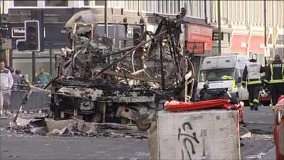 remains of the bus that was set alight in Tottenham