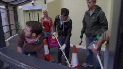 People cleaning up in Liverpool