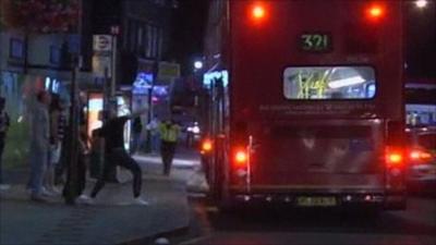 Man throws missile at bus