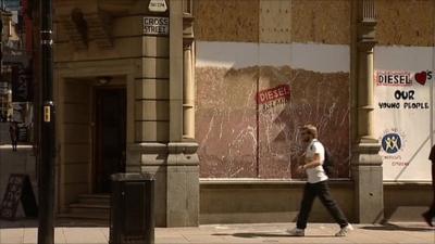 Shop boarded up in Manchester