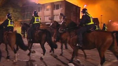 Riot police on horseback