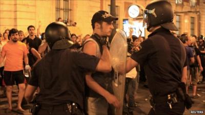 Protesters and police in Madrid