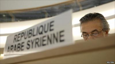 Syrian ambassador to the UN behind his desk