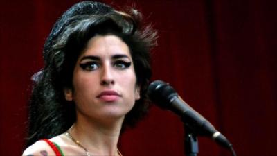 Amy Winehouse performs on the Pyramid stage at the 2007 Glastonbury Festival at Worthy Farm in Pilton, Somerset.