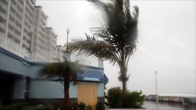 Waves lash an apartment block in Ocean City