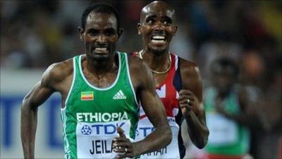 Ethiopia's Ibrahim Jeilan runs ahead of Britain's Mohammed Farah