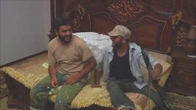 Rebels bouncing on bed in Gaddafi desert retreat