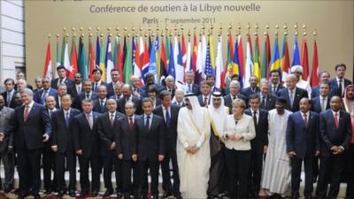 World leaders gather for class photo at conference on Libya in Paris