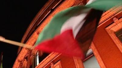 Palestinian flag being waved outside the Royal Albert Hall in London