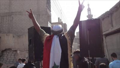 People protesting against President Bashar al-Assad