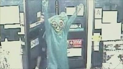 Robber dressed as cartoon character Gumby