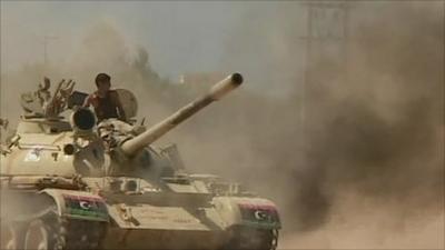 Rebels on tanks near Sirte