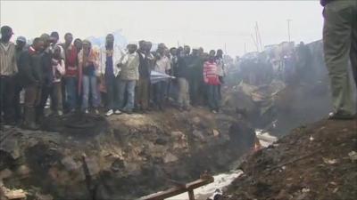 People gathered at the scene of the fire