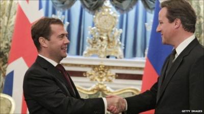 Russia's President Dmitry Medvedev (L) and British Prime Minister David Cameron (R)