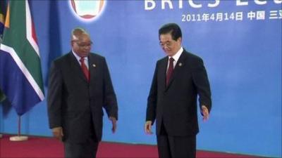 South African president Jacob Zuma is greeted by Chinese President Hu Jintao