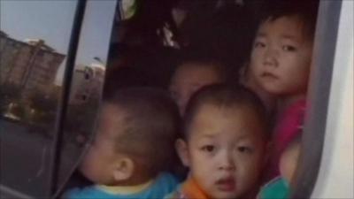 Chinese children packed in a van