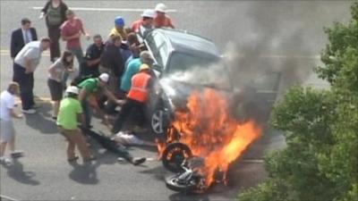 Flaming wreckage at accident scene