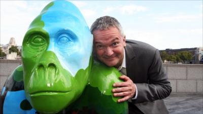 Piers Gibbon with one of the Gorilla statues