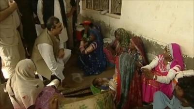 Pakistan's Prime Minister Yousuf Raza Gilani meets flood victims