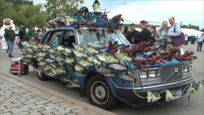 Car fitted with electric singing fish and lobsters