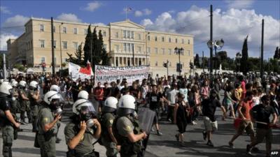 Students and teachers protest in front of parliament