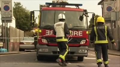 Firefighters at scene of fire