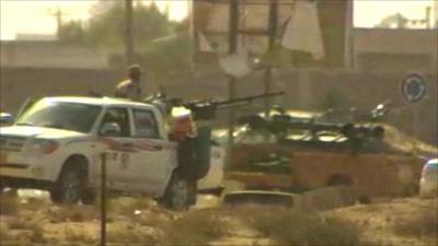 Armed vehicles inside the boundary of Sirte, Libya