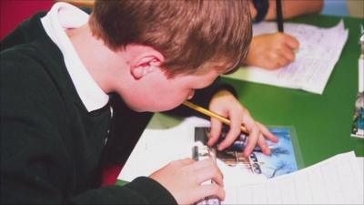 Schoolboy in classroom