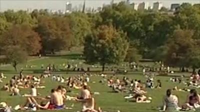 People sunbathing on London's Primrose Hill