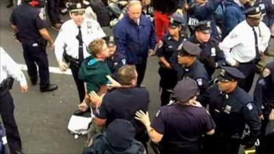 Police arresting protesters on the Brooklyn Bridge