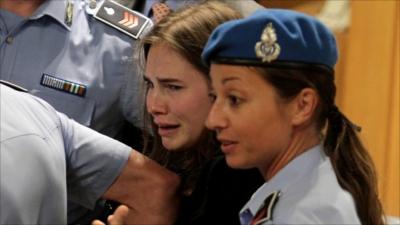 Amanda Knox weeps as an Italian court uphold her appeal