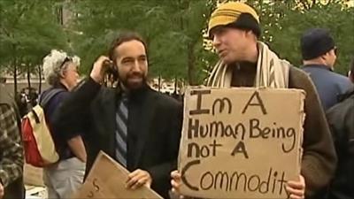 Demonstrators with placard