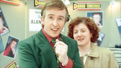 Steve Coogan as Alan Partridge and Felicity Montagu as Lynn