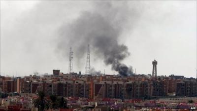 Smoke rising from buildings in Sirte