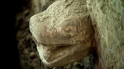 Snake head on Aztec platform, Mexico City