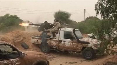 Libya NTC fight Gaddafi forces in streets of Sirte