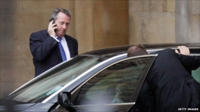 Defence Secretary Liam Fox leaving the MoD