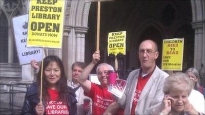 Campaigners for libraries outside the court