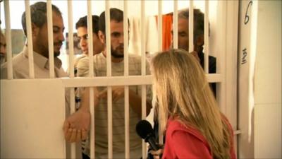 Prisoners speak to the BBC's Caroline Hawley