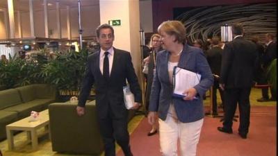 French President Nicolas Sarkozy and German Chancellor Angela Merkel