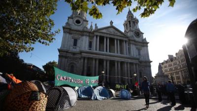 Protestor outside St Paul's