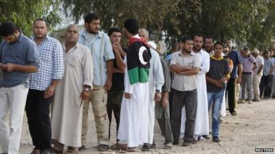 Libyans queue to see Colonel Gaddafi's body