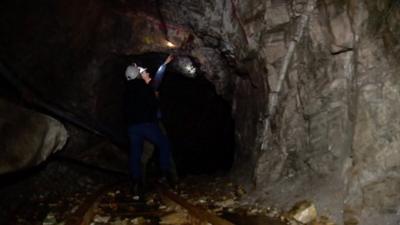 Inside the mine from which a company would like to extract gold.