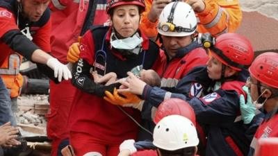 Two week old baby rescued from rubble