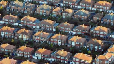 Aerial shots of red brick houses