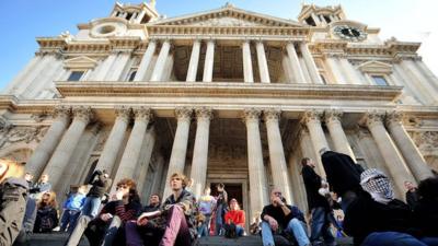 Protesters sitting outside St Paul's