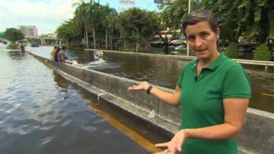 Rachel Harvey on flooded street