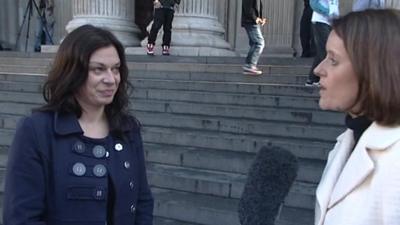 Protester and BBC reporter outside St Paul's cathedral