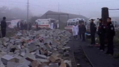 Emergency services at scene of explosion at coal mine in China