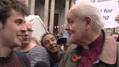 Bishop of London with protesters